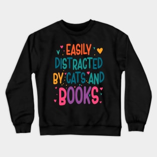 easily distracted by cats and books Crewneck Sweatshirt